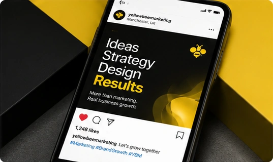 A phone displaying a black and yellow Yellow Bee Marketing social media post.